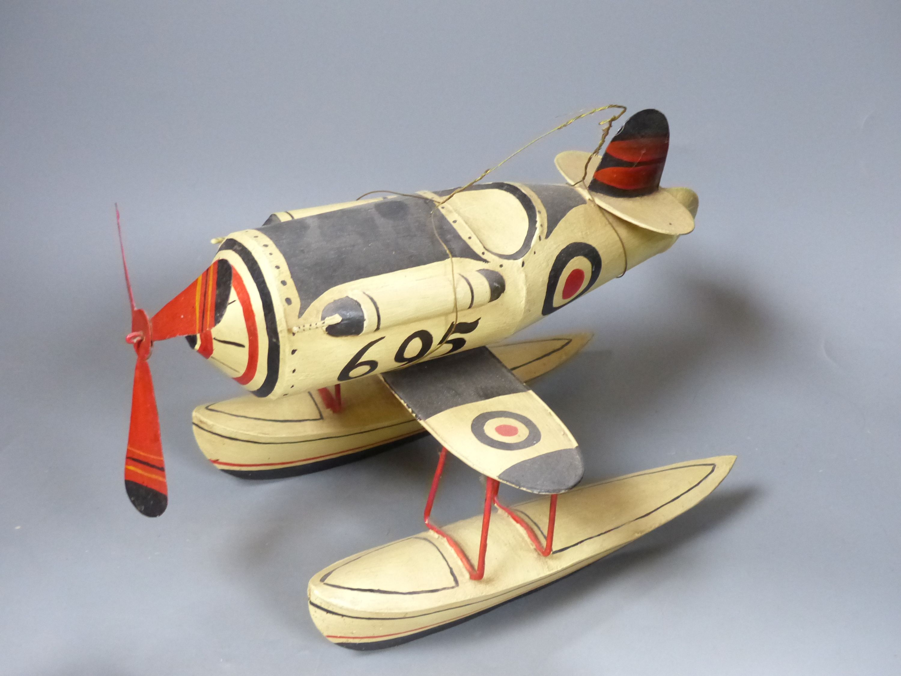 Model of a seaplane and one of a bi-plane